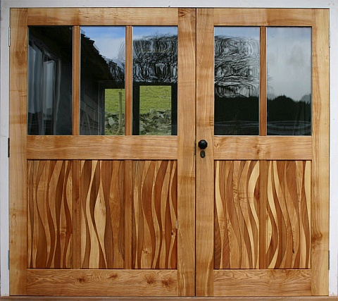 Exterior doors with wavy panels
